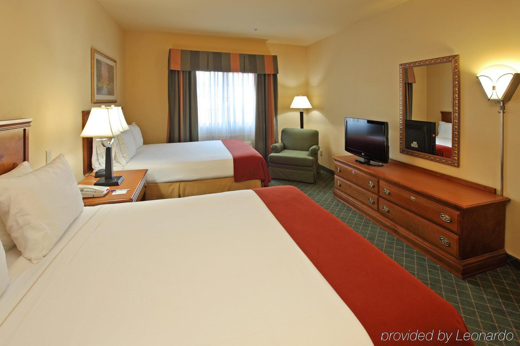 Holiday Inn Express & Suites Magnolia-Lake Columbia Rum bild
